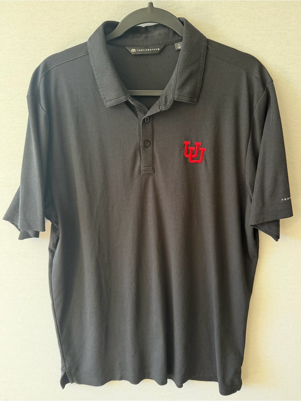 TravisMathew Black Polo with Red Embroidered University of Utah Logo